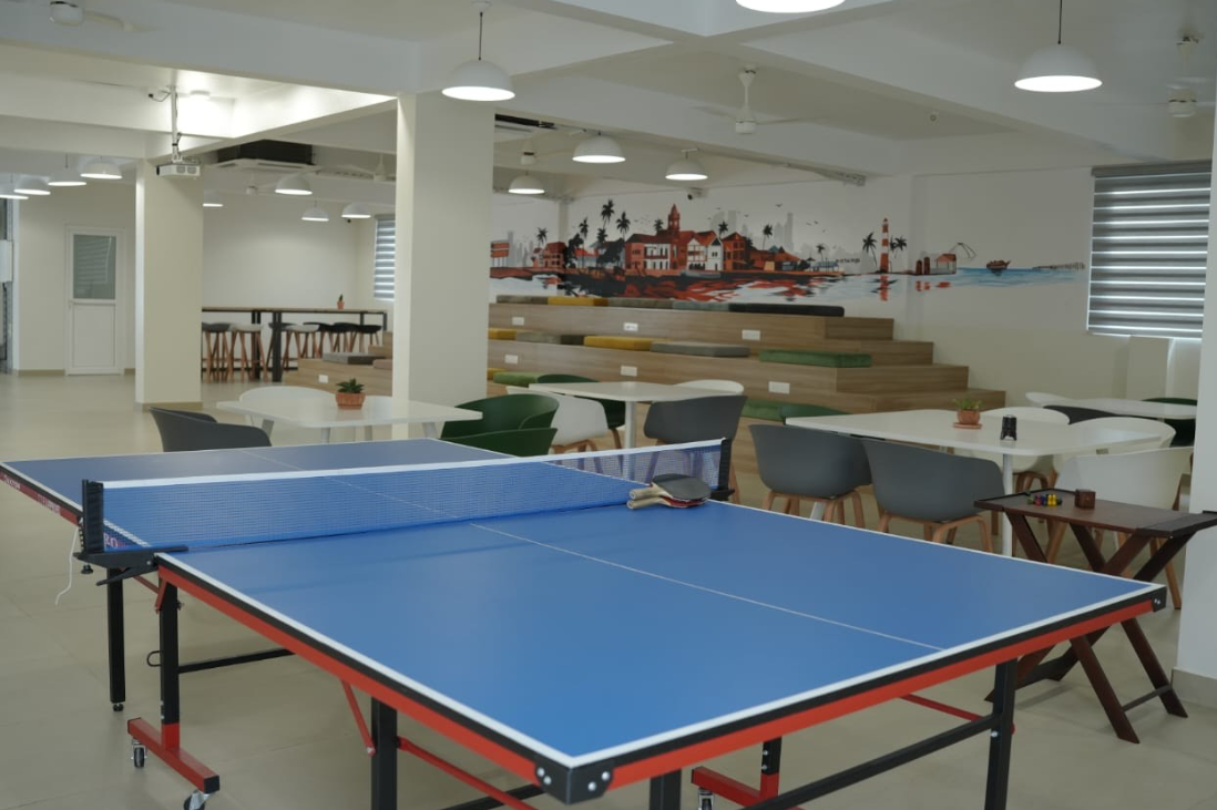edeXaLabs breakout area with ping pong table and local mural